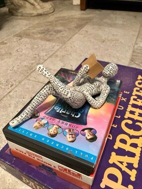Decorative Reading Female Figurine in White with Black Script - Unbranded